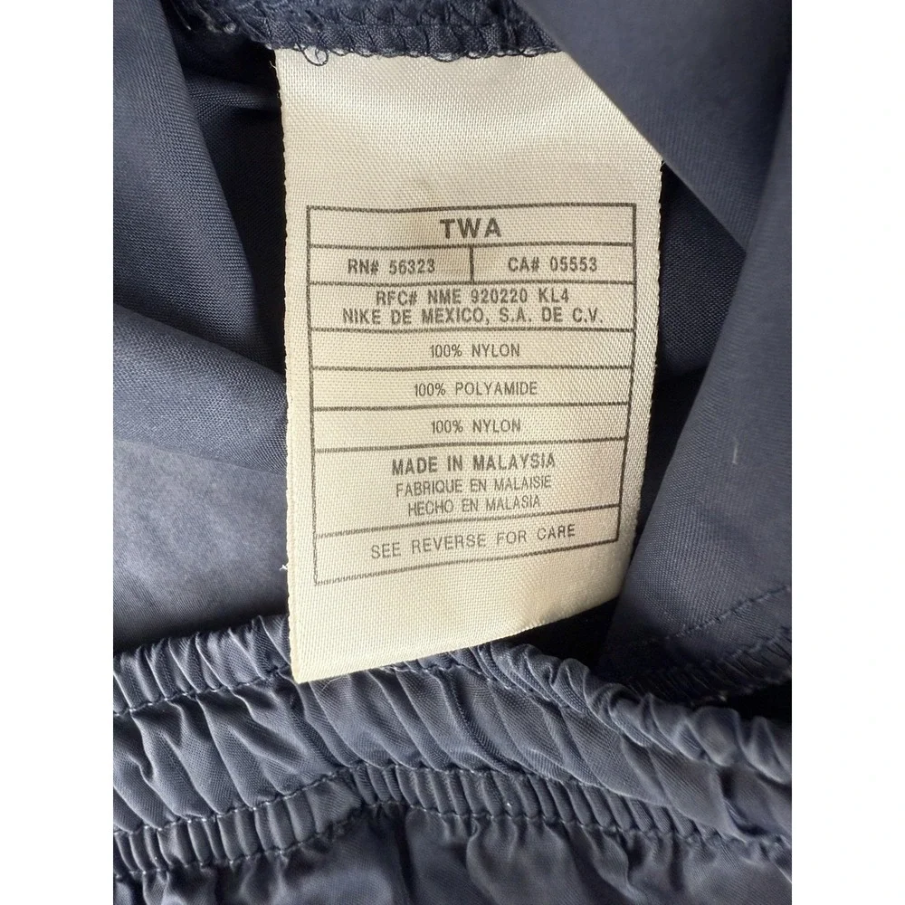 Vintage Nike White Tag Navy Tapered Ankle‎ Zip Nylon Windbreaker Men's XL